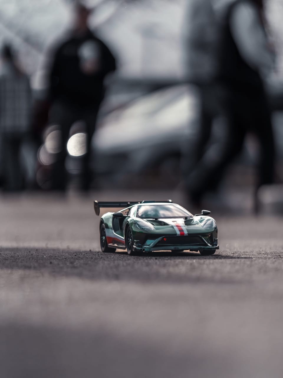 Radio-controlled race car on the pavement