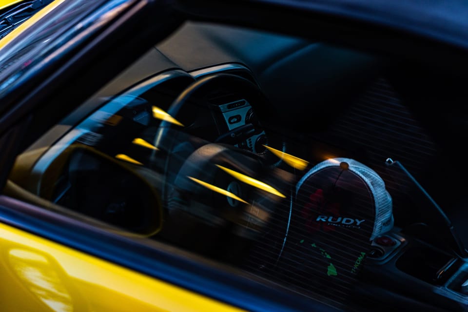 Moody interior detail of a yellow sports car