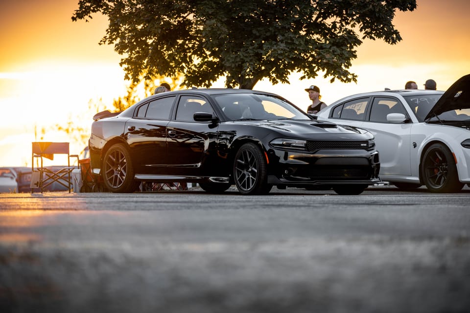 Black Dodge Charger Hellcat at sunset